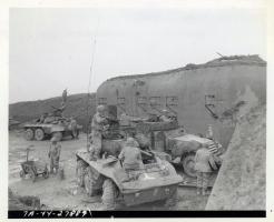 Ligne Maginot - ROHRBACH - FORT CASSO - (Ouvrage d'infanterie) - Bloc 2
American troops of a cavalry reconnaissance squadron. The scarred, out-dated Maginot casemate is used in present battle only as a shield from which to observe enemy activity.

92nd Cavalry Recon. Squadron, 12th Armored Division.